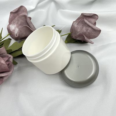Il viaggio cosmetico di plastica rotondo dei barattoli ha fissato la timbratura calda dei contenitori 50g con il modello differente