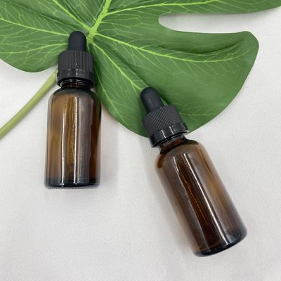 Il cosmetico di vetro ambrato 30ml imbottiglia l'olio essenziale con il contagoccia della chiusura del cricco