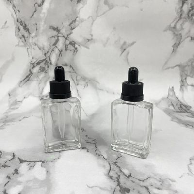 Il cosmetico di vetro del quadrato 30ml imbottiglia il cappuccio innocuo per i bambini del contagoccia per l'olio di cura di capelli