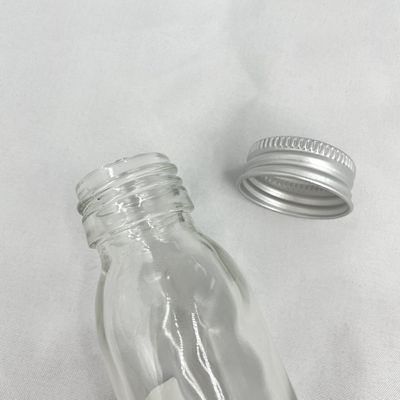 Non rovesci la bottiglia di vetro d'imballaggio cosmetica 60ml di cura di pelle con il cappuccio di alluminio