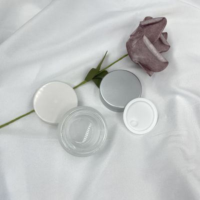 Il cosmetico di vetro su ordinazione rotondo 20g stona l'altezza d'imballaggio 3.2cm del diametro 4.7cm