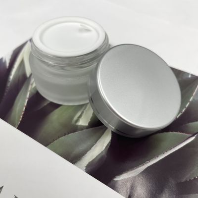 Il cosmetico di vetro su ordinazione rotondo 20g stona l'altezza d'imballaggio 3.2cm del diametro 4.7cm