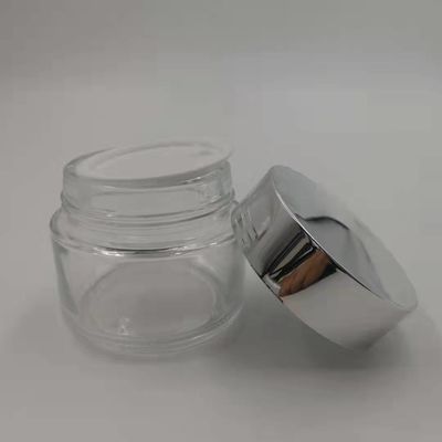 Barattolo della crema di vetro della radura 100g di MSDS con il fango bianco della maschera del coperchio del cappuccio d'argento brillante