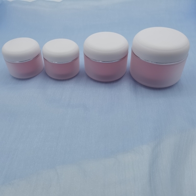 I pp rotondi raddoppiano il barattolo cosmetico della crema 100g per l'idratante di cura di pelle