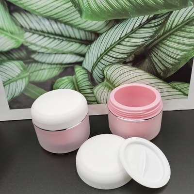 I pp rotondi raddoppiano il barattolo cosmetico della crema 100g per l'idratante di cura di pelle